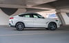 BMW X6 (Белый), 2023 для аренды в Дубай 1