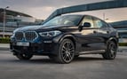BMW X6 M-kit (Dunkelblau), 2022  zur Miete in Dubai
