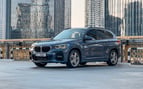 BMW X1 (Gris Oscuro), 2021 para alquiler en Abu-Dhabi