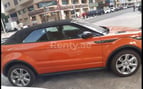 Range Rover Evoque (Orange), 2018 à louer à Dubai