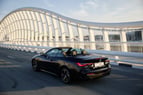 BMW 430i cabrio (Negro), 2023 para alquiler en Dubai 2