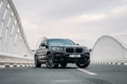 BMW X4 (Черный), 2021 для аренды в Абу-Даби 0