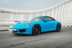 Porsche 911 Carrera cabrio (Azul), 2018 para alquiler en Dubai 0