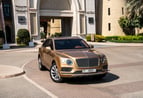 Bentley Bentayga (Oro), 2019 para alquiler en Dubai 2