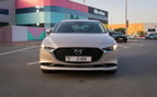 Mazda 3 (Oro), 2024 para alquiler en Abu-Dhabi 0