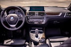 BMW 230i (naranja), 2018 para alquiler en Dubai 2