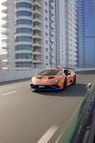 Lamborghini Huracan STO (Оранжевый), 2022 для аренды в Шарджа