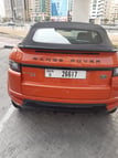 Range Rover Evoque (naranja), 2018 para alquiler en Dubai 1