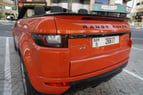 Range Rover Evoque (Orange), 2018  zur Miete in Dubai 1