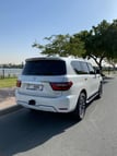 Nissan Patrol  V8 Titanium (Weiß), 2020  zur Miete in Dubai 1