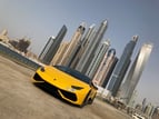 Lamborghini Huracan (Yellow), 2018 para alquiler en Dubai 0