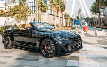 Black BMW 4M Sport Competition cabrio, 2022 for rent in Dubai