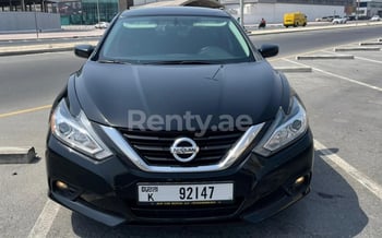 Black Nissan Altima, 2018 for rent in Dubai