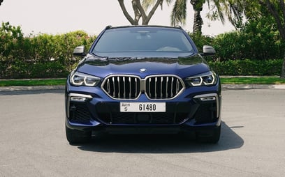 BMW X6 M50 (Blau), 2022  zur Miete in Dubai