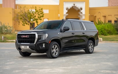 GMC Yukon XL (Nero), 2021 in affitto a Abu Dhabi