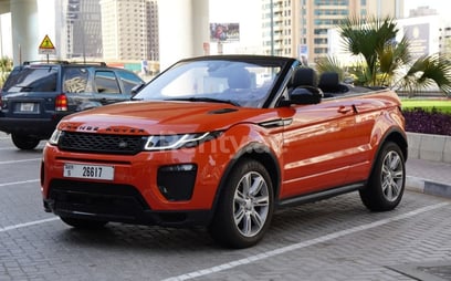 Range Rover Evoque (Orange), 2018 à louer à Sharjah