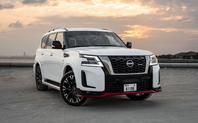 Nissan Patrol V8 with Nismo Bodykit and latest generation interior (White), 2021 for rent in Dubai