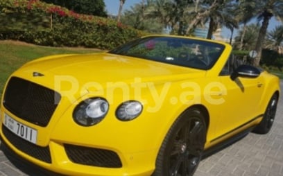 Bentley Continental GTC (Желтый), 2017 для аренды в Дубай