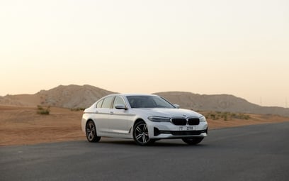 BMW 520i (White), 2023 for rent in Sharjah