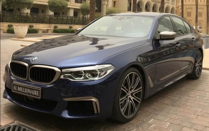 Аренда Black BMW 5 Series M550 2017 в Дубае