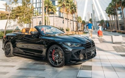 Black BMW 4M Sport Competition cabrio 2022 للإيجار في دبي