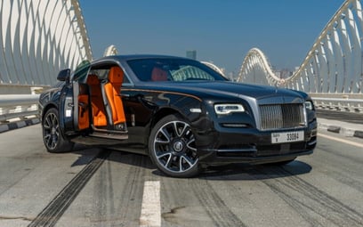 Black Rolls Royce Wraith Silver roof 2019 for rent in Dubai