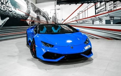 Blue Lamborghini Huracan spyder 2018 for rent in Dubai