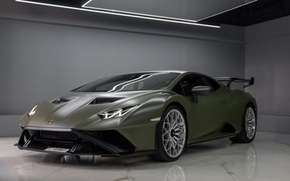 Green Lamborghini Huracan STO 2022 for rent in Dubai