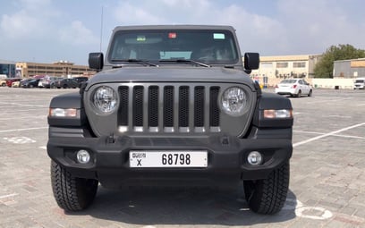 Grey Jeep Wrangler Unlimited Sports 2021 for rent in Dubai