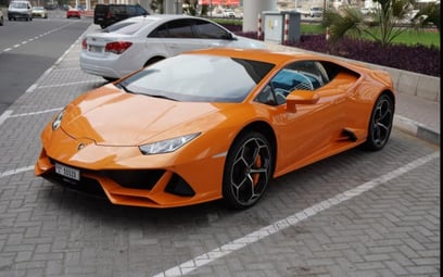 Orange Lamborghini Huracan Evo 2019 for rent in Dubai