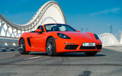Orange Porsche Boxster 718 2020 for rent in Dubai