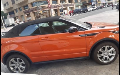 Orange Range Rover Evoque 2018 在迪拜出租