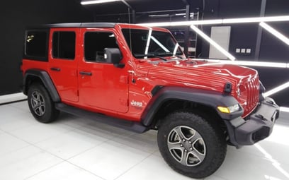 Red Jeep Wrangler 2018 en alquiler en Dubai
