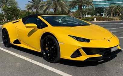 Yellow Lamborghini Evo Spyder 2022 for rent in Dubai