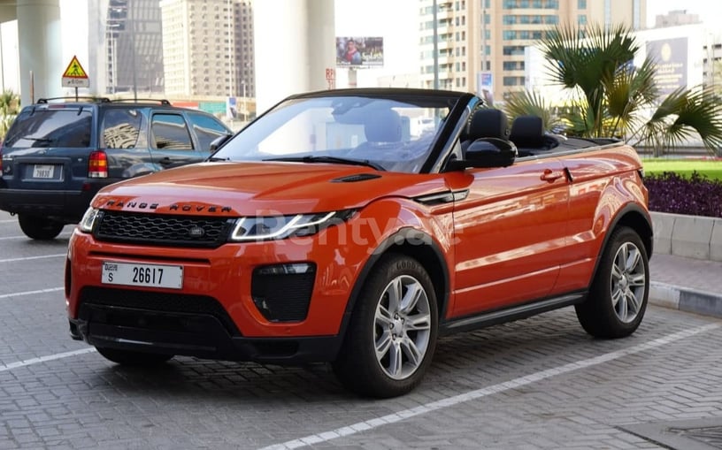 Range Rover Evoque (Оранжевый), 2018 для аренды в Дубай