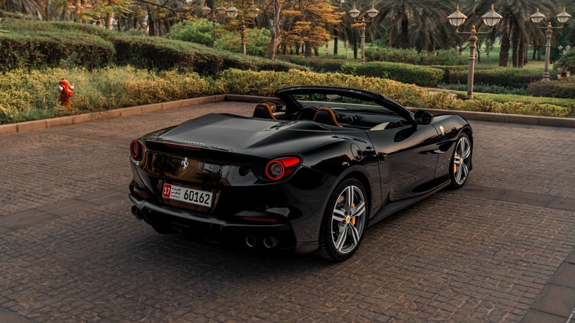 Ferrari Portofino Rosso (Black), 2022 for rent in Abu Dhabi