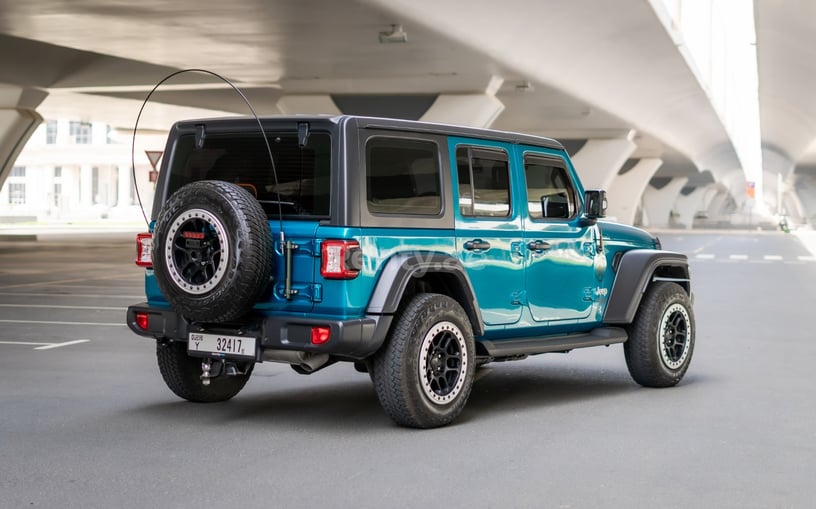 Jeep Wrangler Limited Sport Edition convertible (Blau), 2020  zur Miete in Abu Dhabi