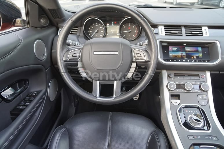 Range Rover Evoque (Orange), 2018 for rent in Sharjah