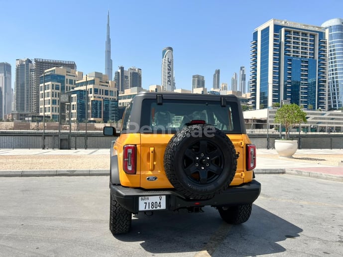 Ford Bronco Wildtrak 2021 (Yellow), 2021 for rent in Dubai