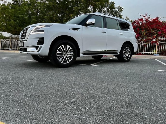 Nissan Patrol Platinium (White), 2022 for rent in Abu Dhabi