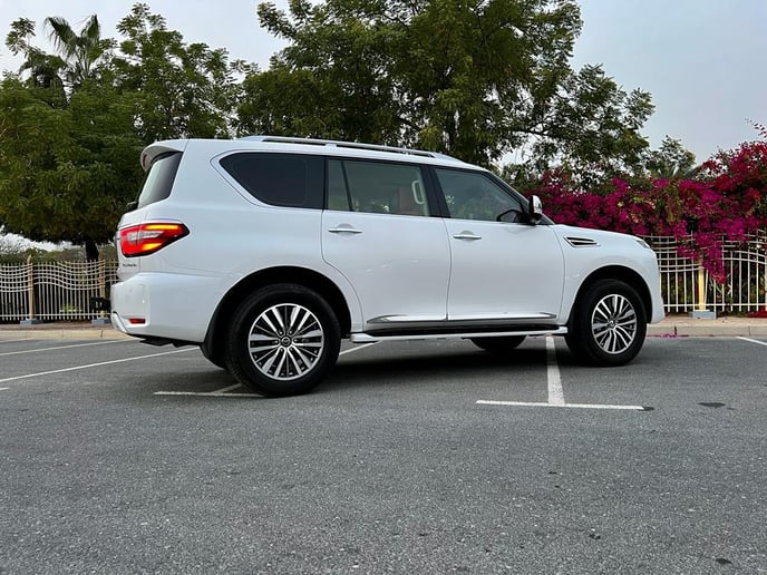Nissan Patrol Platinium (White), 2022 for rent in Abu Dhabi
