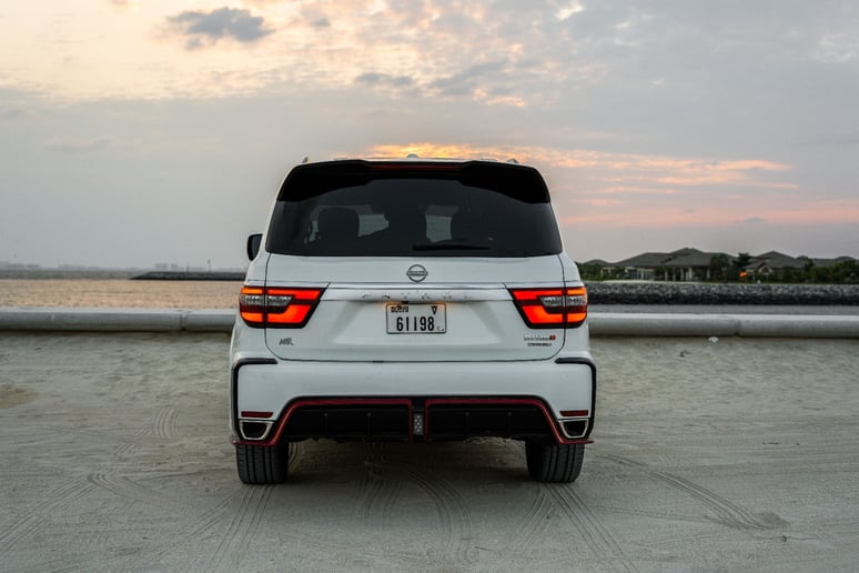 Nissan Patrol V8 with Nismo Bodykit and latest generation interior (White), 2021 for rent in Dubai