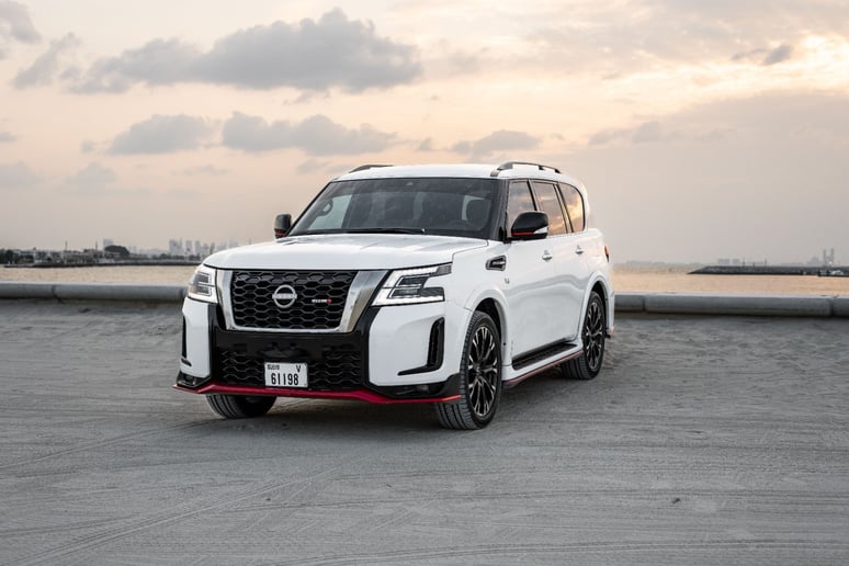 Nissan Patrol V8 with Nismo Bodykit and latest generation interior (White), 2021 for rent in Dubai