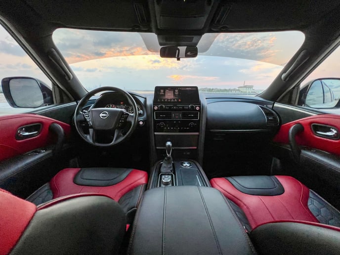 Nissan Patrol V8 with Nismo Bodykit and latest generation interior (White), 2021 for rent in Dubai