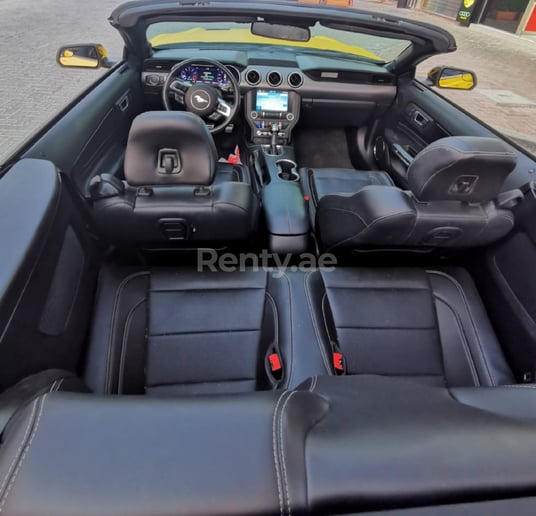 Ford Mustang cabrio (Yellow), 2018 for rent in Sharjah