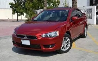 Mitsubishi Lancer (Rot), 2016 zur Miete in Dubai