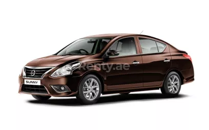 Şarika'de kiralık Nissan Sunny (Kahverengi), 2019