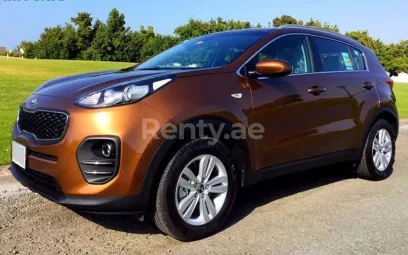 KIA Sportage (Бронзовый), 2017 для аренды в Дубай
