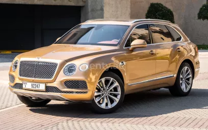 Bentley Bentayga (Золотой), 2019 для аренды в Дубай