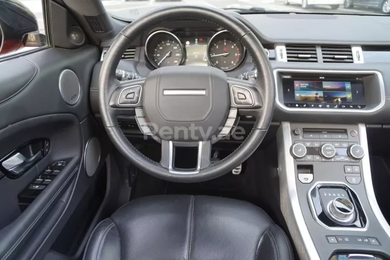 Range Rover Evoque (Orange), 2018 for rent in Sharjah